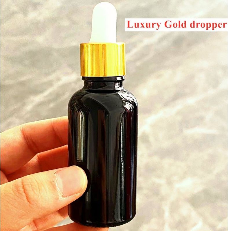 10ml 20ml 30ml 50ml empty round Essential Oil Bottle Shiny Black Glass Dropper Bottle with Calibrated Glass Piegette