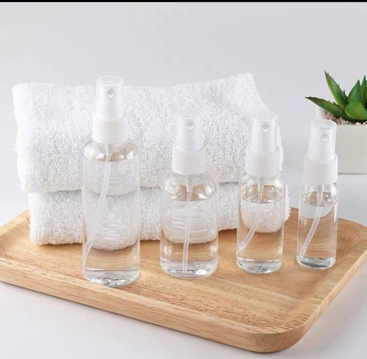 50ml 60ml 100ml PET clear round customize refillable hand sanitizer round refill cosmetic PET plastic spray bottle